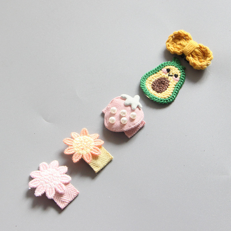 Pastel fabric clips with peach avocado flower and bow details
