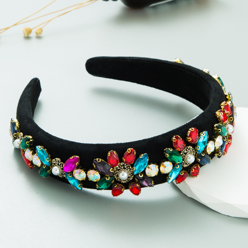 Black padded headband showing curved structured profile