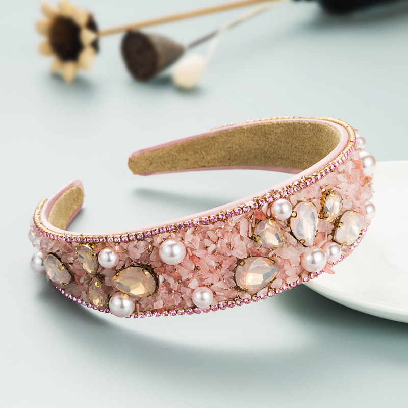 Pink padded headband with soft-looking inner lining