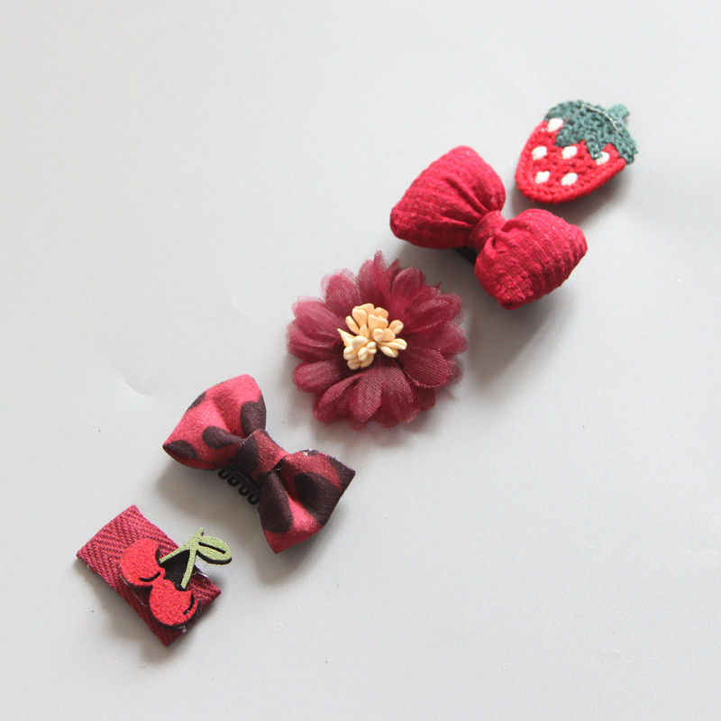 Textured burgundy clips with stitched cherry and flower details