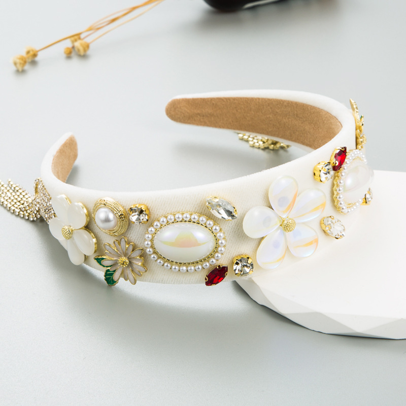 Ivory floral headband with pearl and rhinestone embellishments