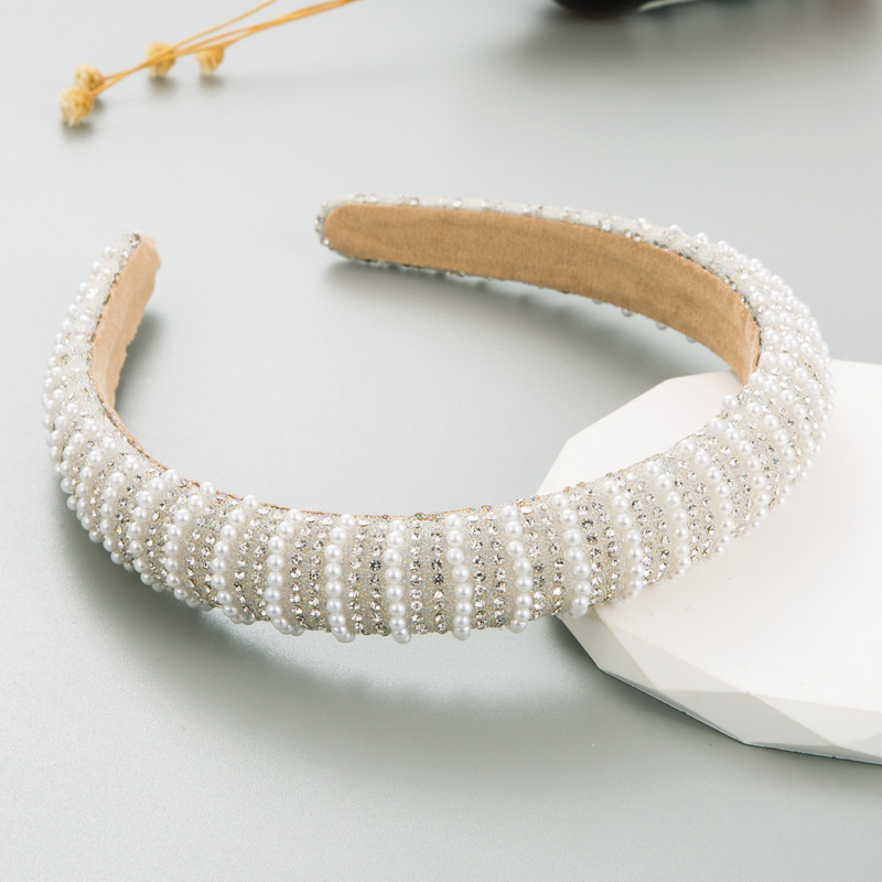 Bright pearl rows and rhinestones on headband