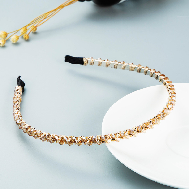 Champagne gold headband with wrapped black ends