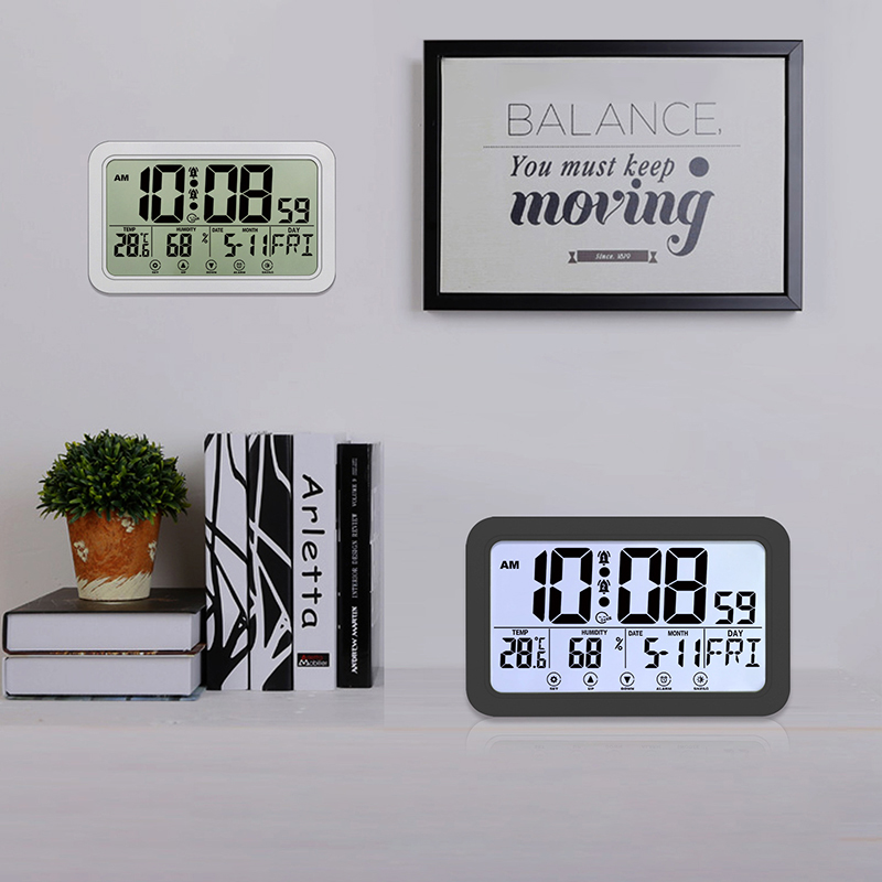 Clocks and motivational quote displayed.