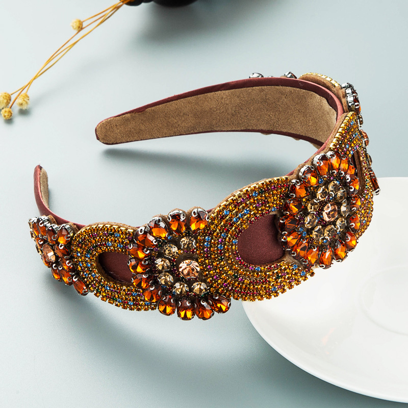 Wide curved padded headband shown in profile