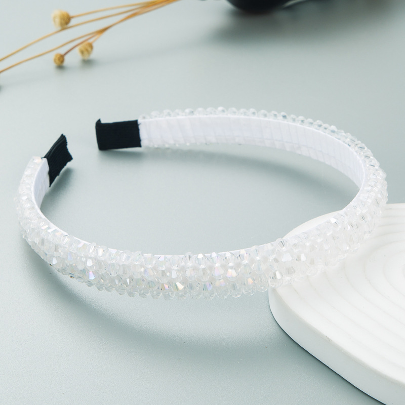 Crystal white headband showing layered braided rows
