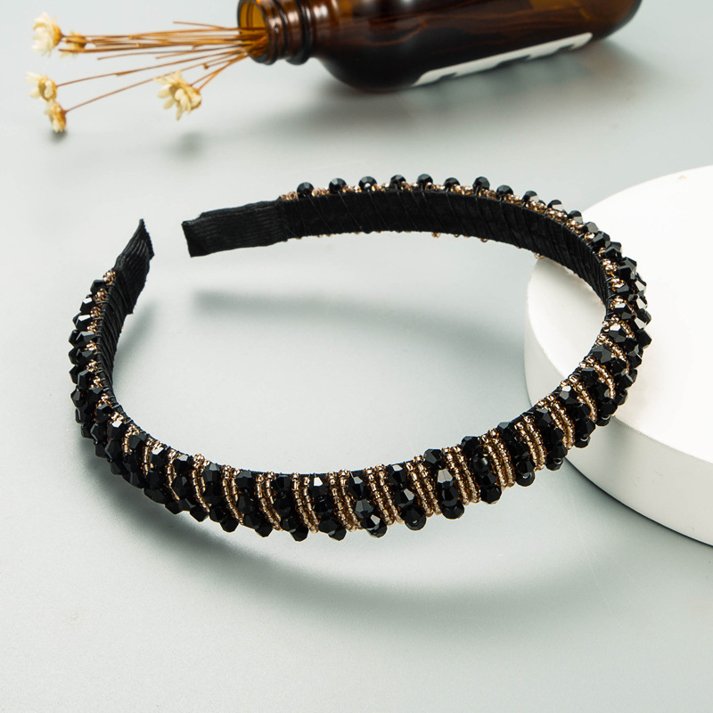 Black headband showing covered open ends