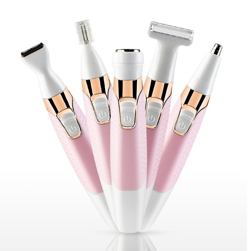 Compact pink electric groomer with USB charging cable