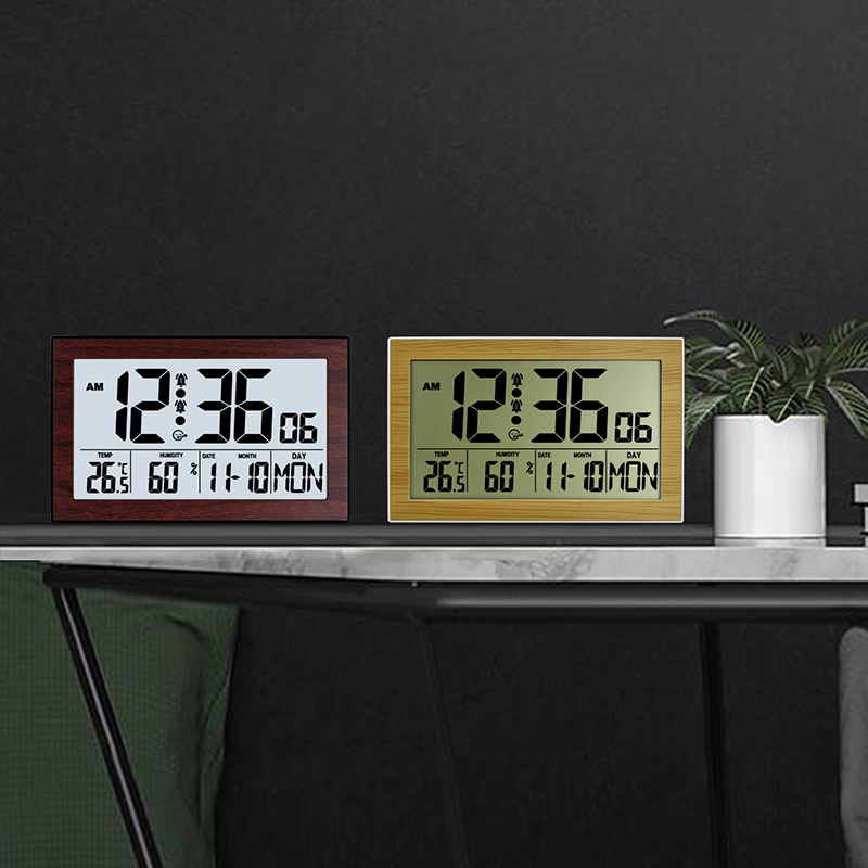 Two digital wooden wall clocks  displaying time, date, temperature.