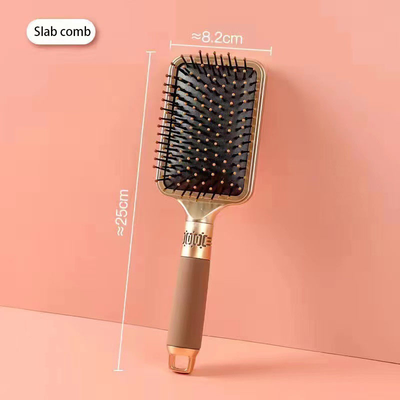 Wide paddle brush with large cushioned surface