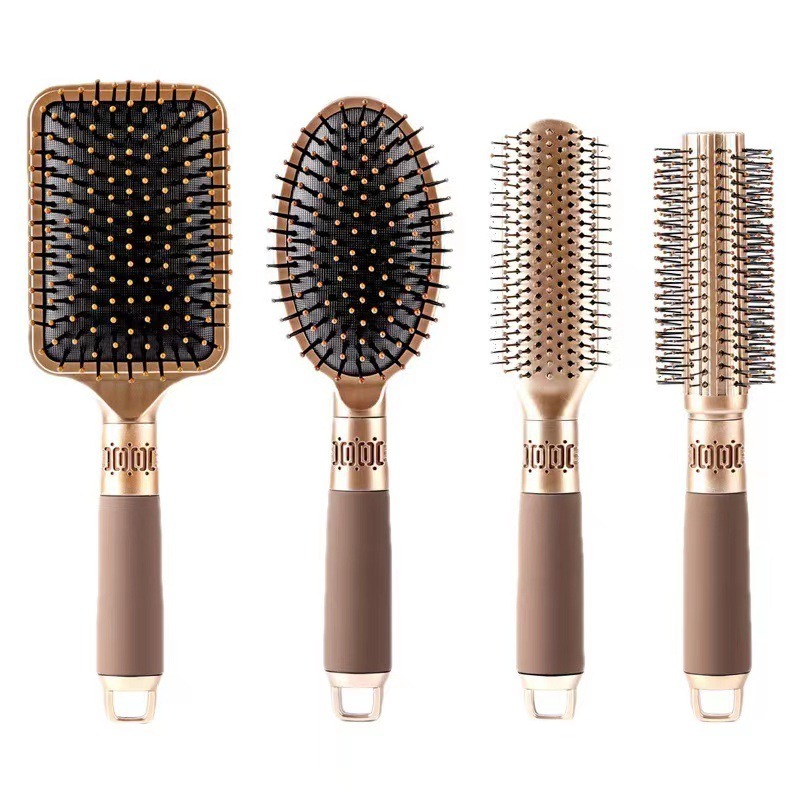 Coordinated hair brushes ready for bathroom storage