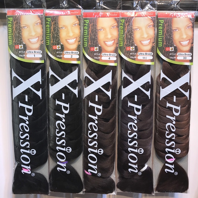 Clear packages containing smooth bundled braid hair