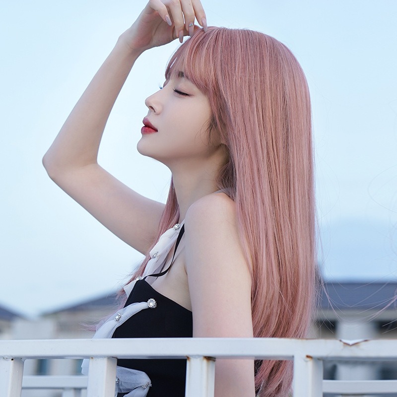 Long straight pink wig flowing past shoulders