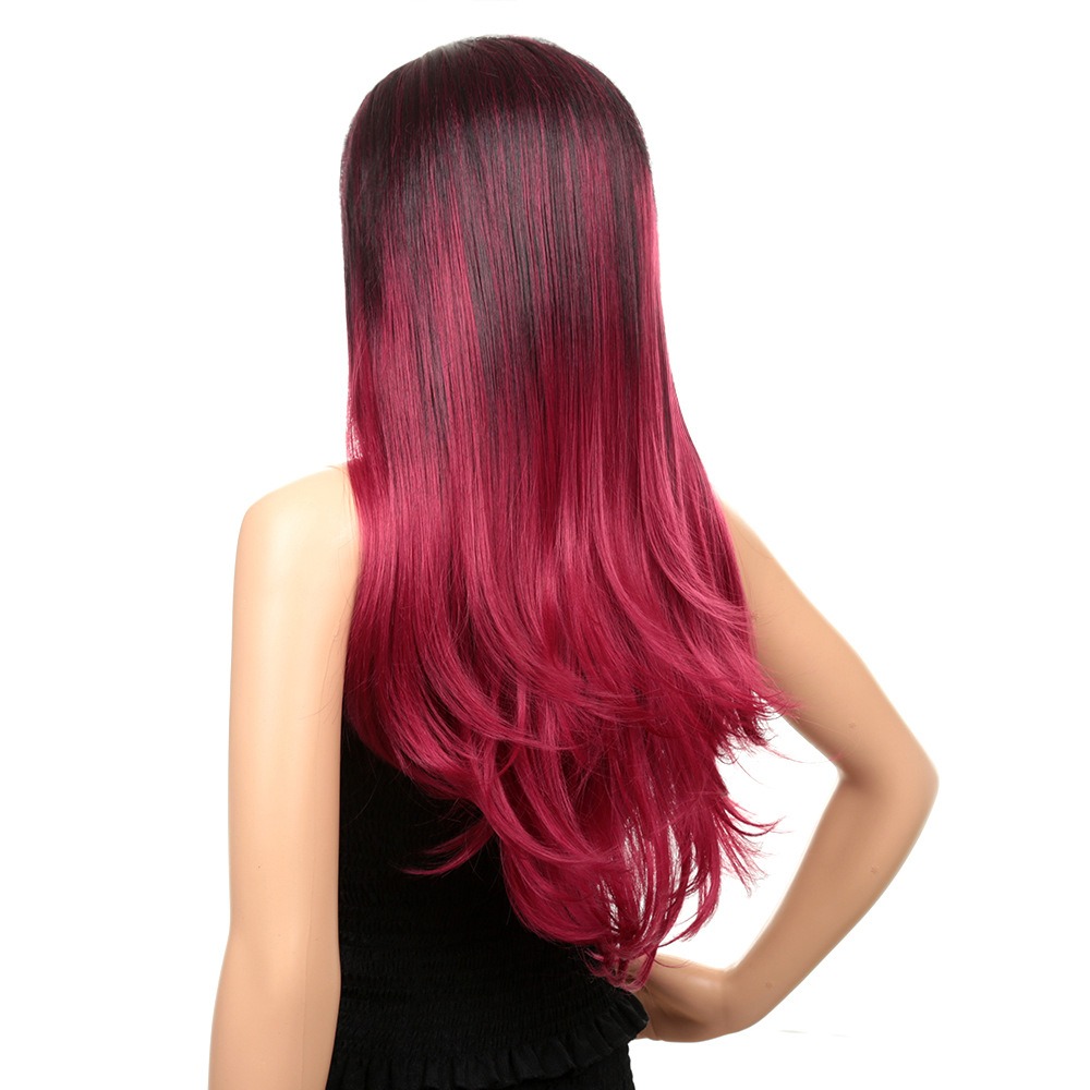 Rear view showing long layered curled wig length