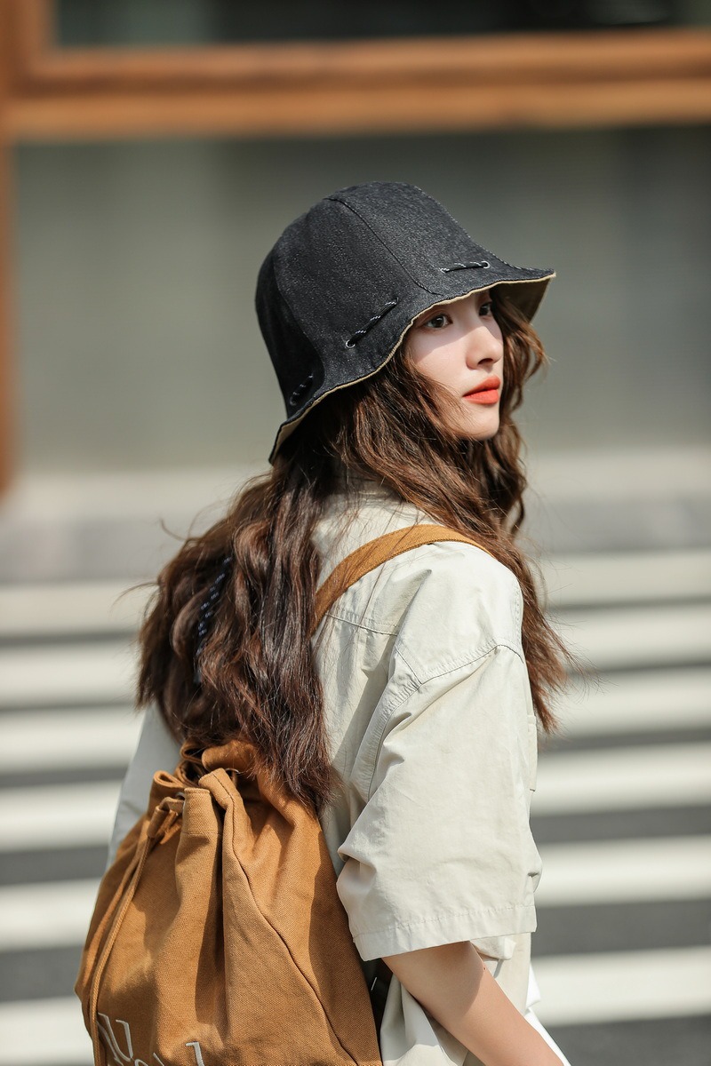 Women summer drawstring denim fisherman hat showing face small spring and summer sun protection and