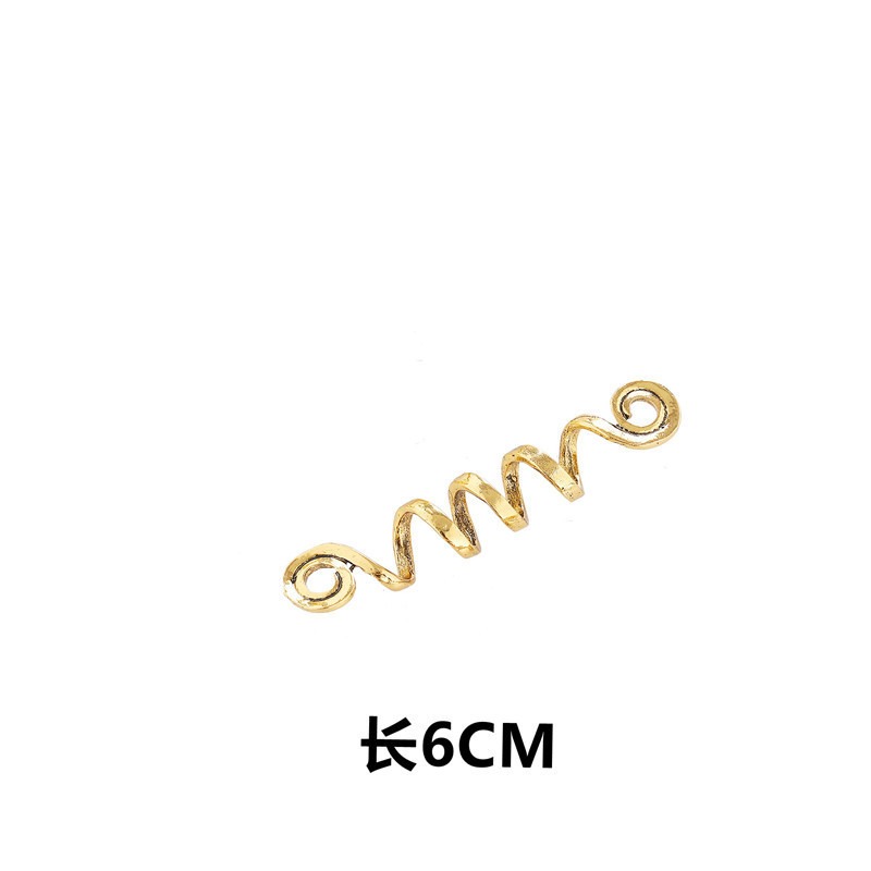 Gold tone spiral hairpin showing compact coiled design