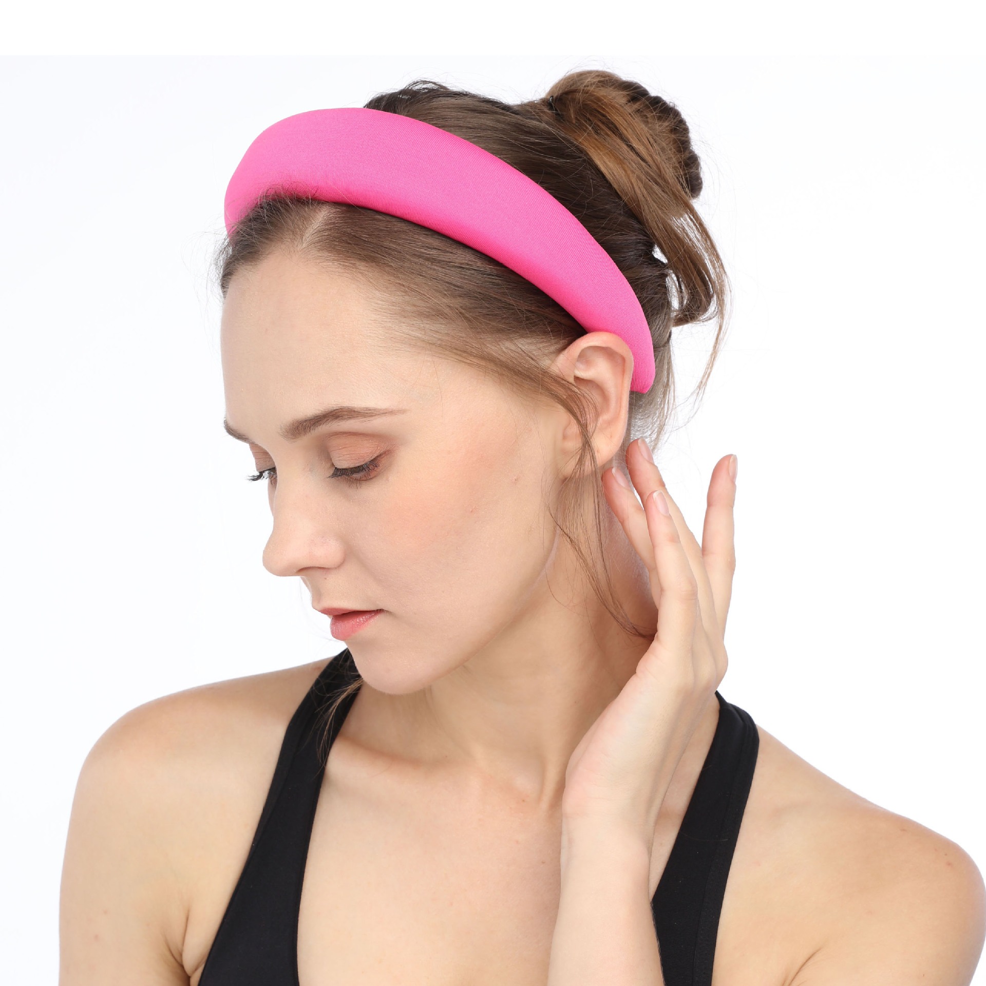 Woman wearing wide pink velvet hair band