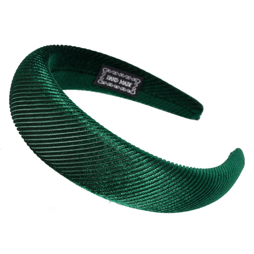 Ribbed velvet texture on green headband