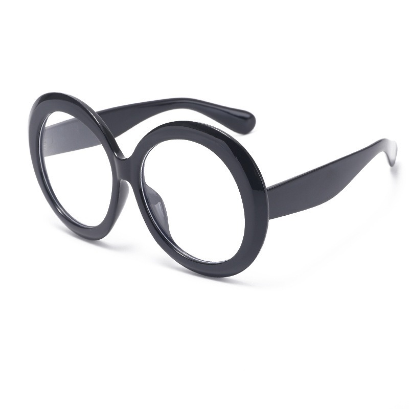 Glossy black oversized circular sunglasses with broad temples