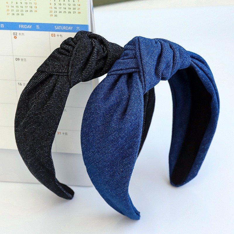 Dark denim headbands showing smooth inner bands