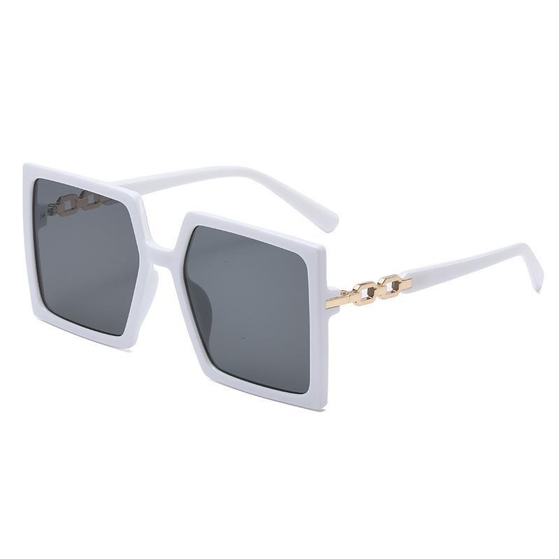 White sunglasses with smoky gray tinted lenses