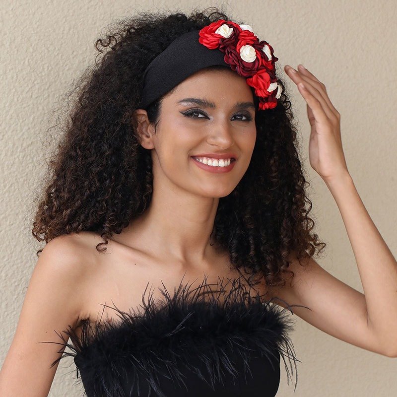 Asymmetrical flower arrangement framing model's face