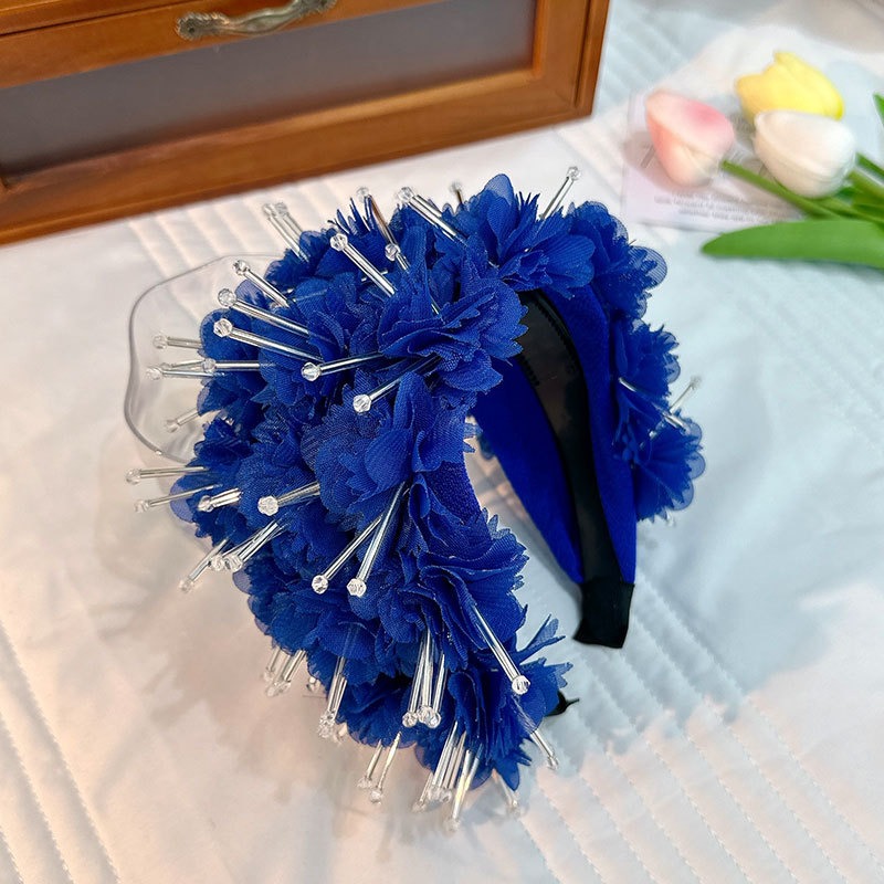 Royal blue headband with reflective silver rods