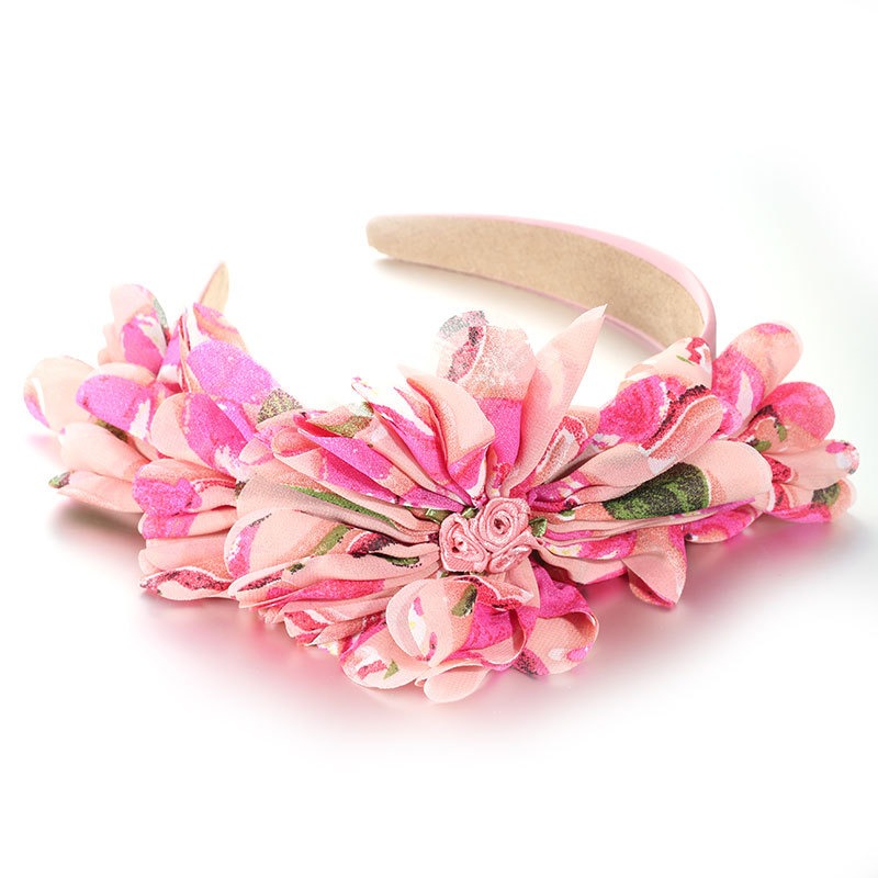 Pink blush floral headband with vivid patterned fabric petals