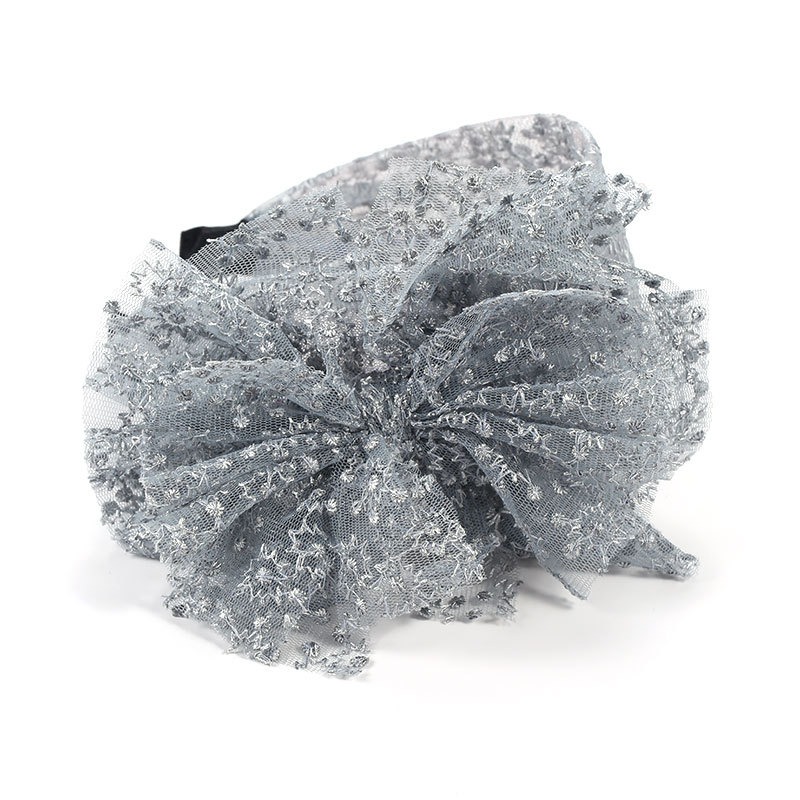 Silver gray floral lace texture closeup