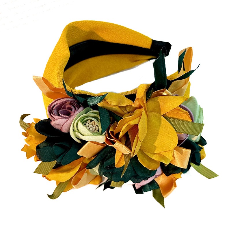 Warm mustard floral headband with contrasting foliage