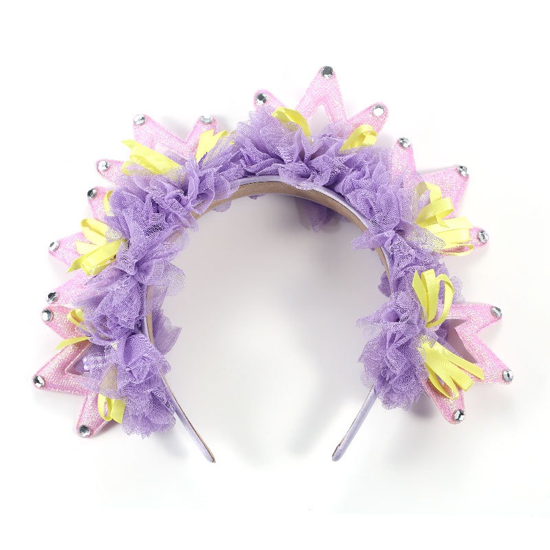 Lavender fabric crown with layered flowers and ribbons