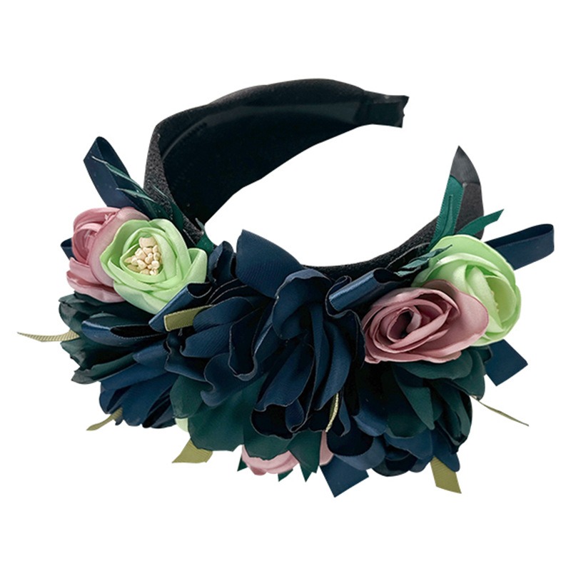 Padded fabric band beneath layered floral decoration
