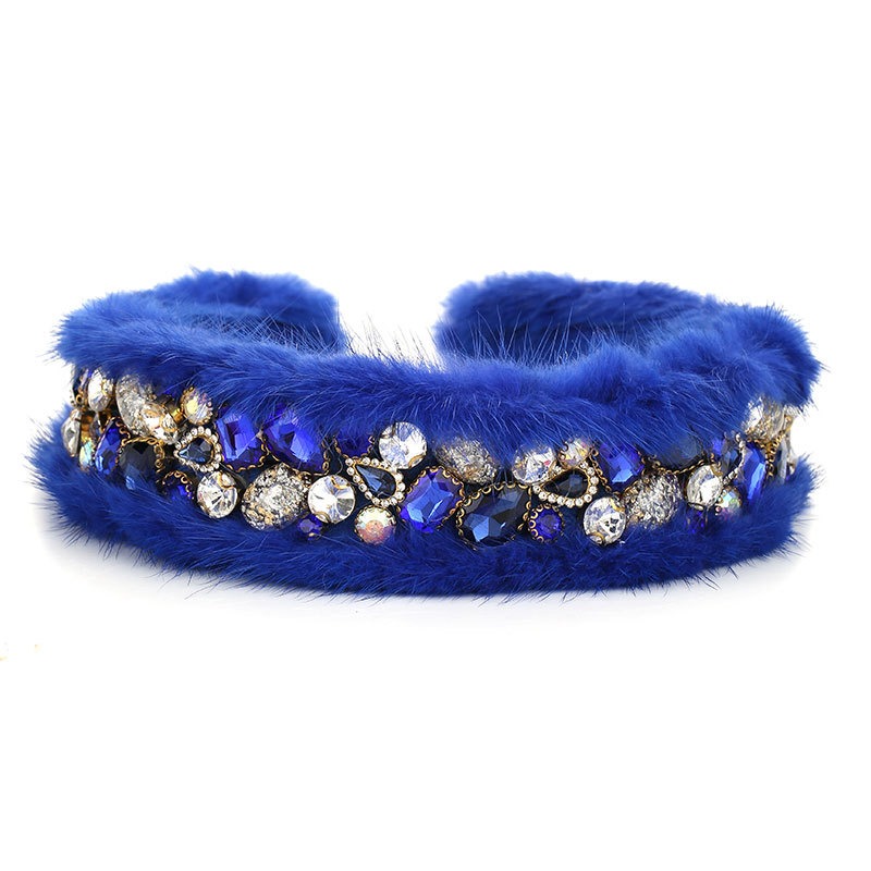 Royal blue jeweled hoop styled as a statement accessory