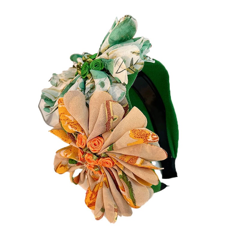 Light botanical headband with layered fabric flowers