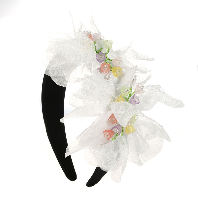 White headband showing layered sheer flower arrangement