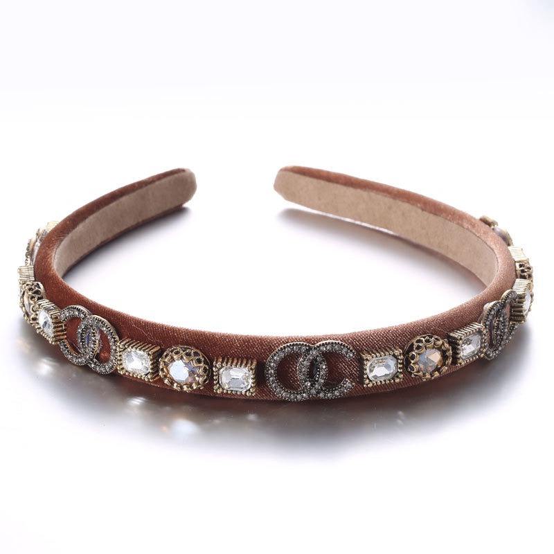 Brown velvet-style headband with repeating silver crystals