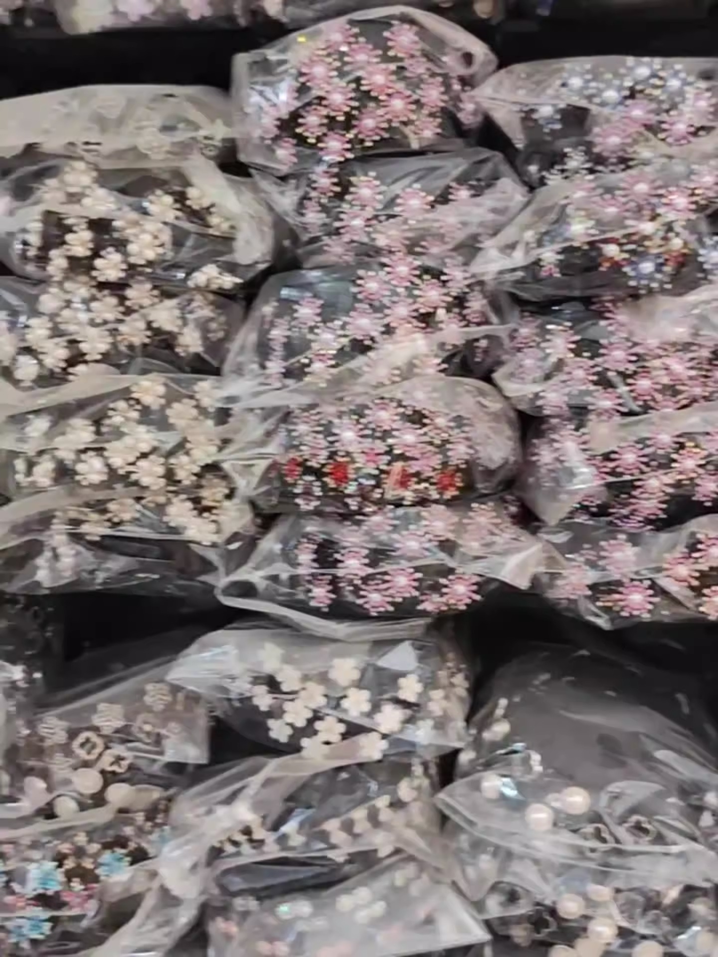 Packaged pearl headbands showing romantic color variations
