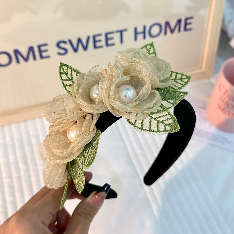 Layered sheer fabric flowers on floral headband