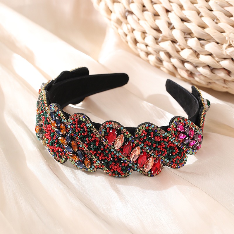 Detailed seed beads and faceted stones on hoop