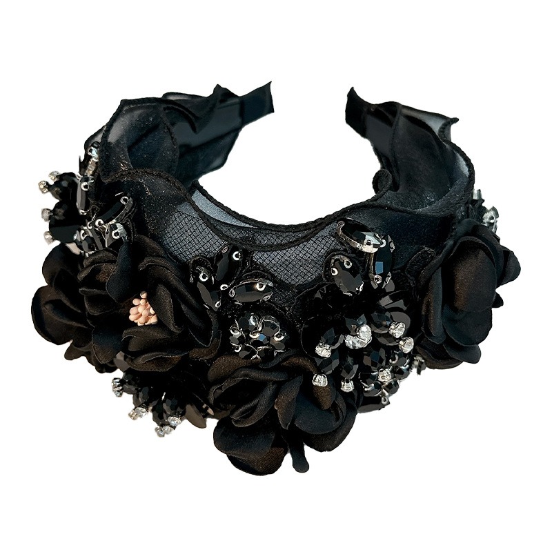 Black floral headband showing dense layered flower construction