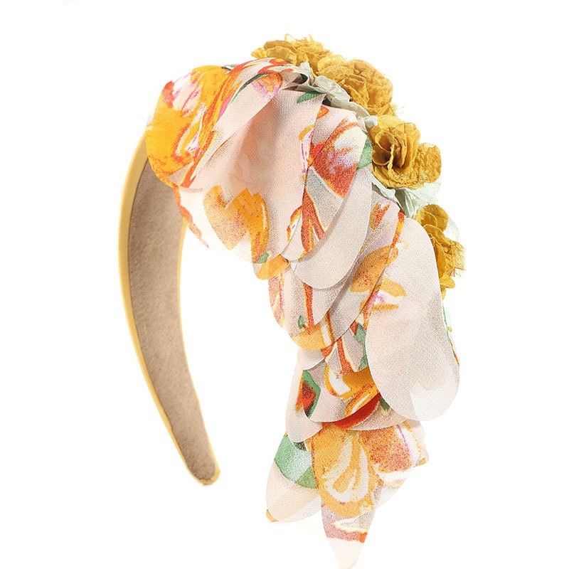 Orange and cream headband showing covered padded base
