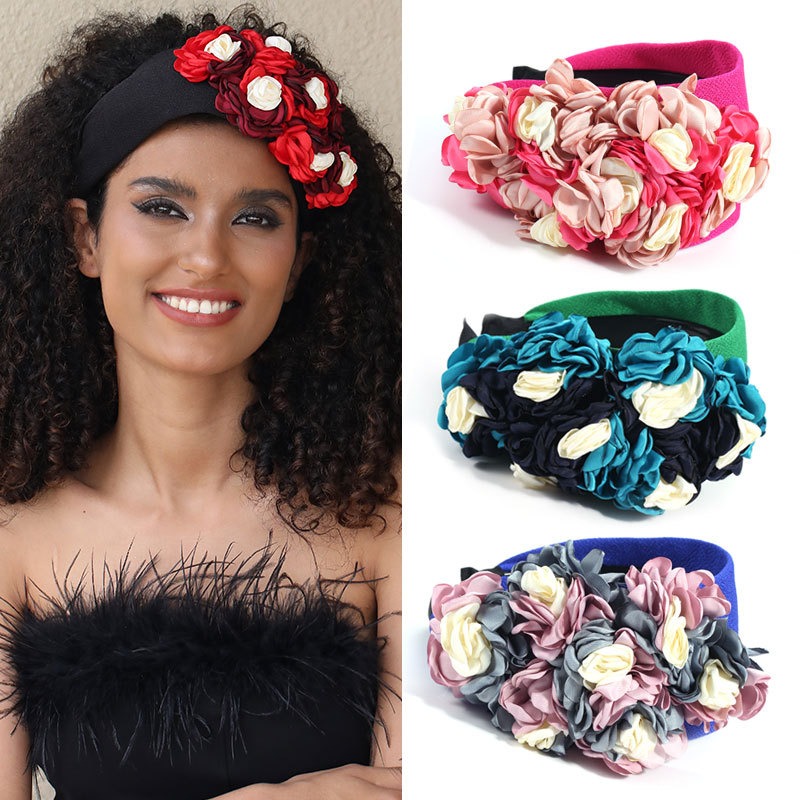 Model showing multiple colorful floral headband options