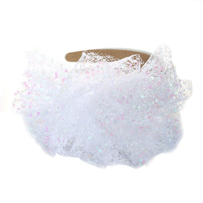 White wide headband showing smooth structured edge