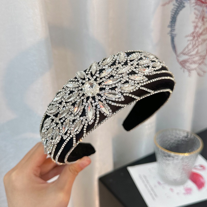 Close view of floral crystal burst on ornate headband