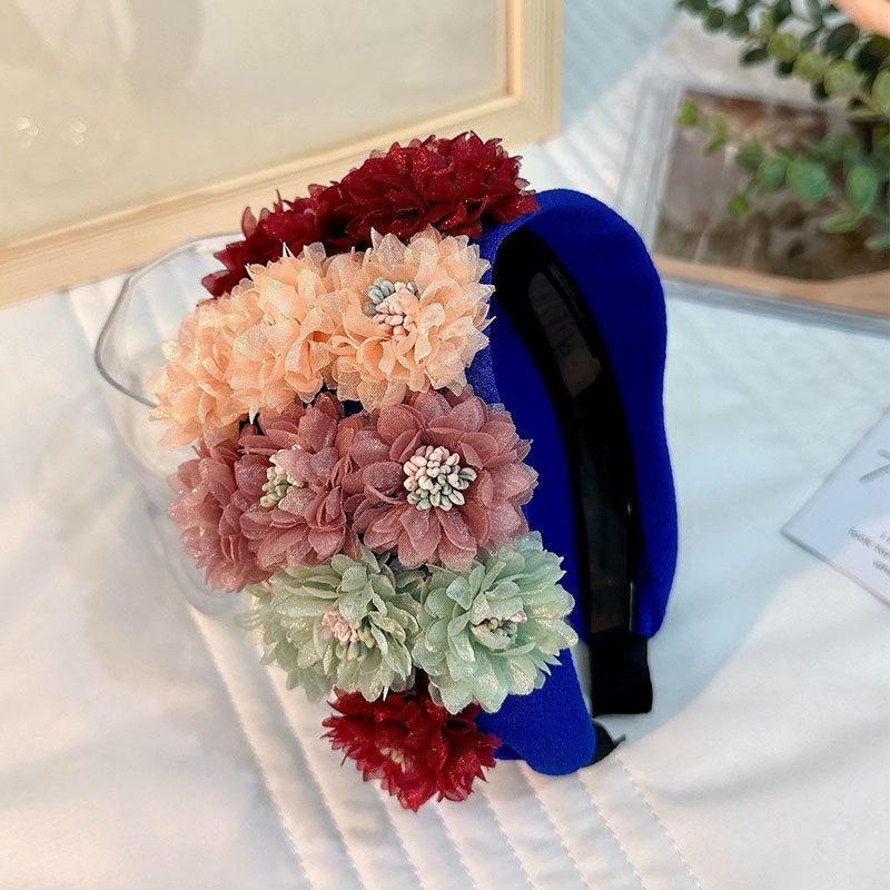 Colorful floral headbands showing wide silhouettes