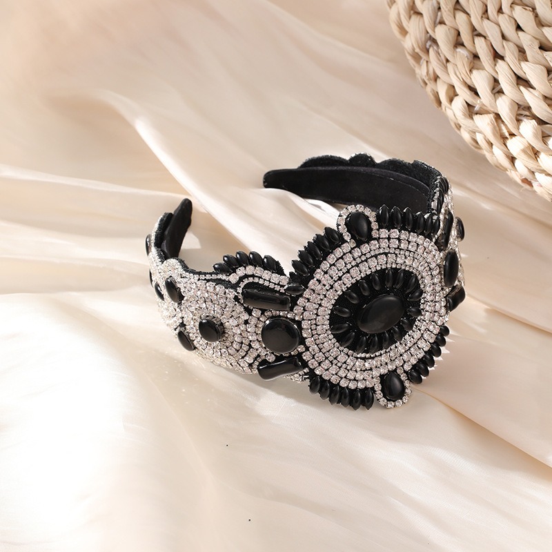 Black and silver wide headband with floral jewel motifs