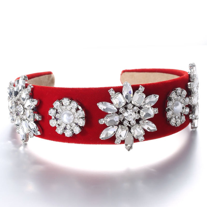 Red headband showing symmetrical crystal floral appliques