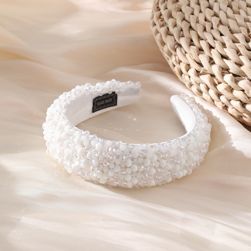 Pearl white padded headband with dense beadwork