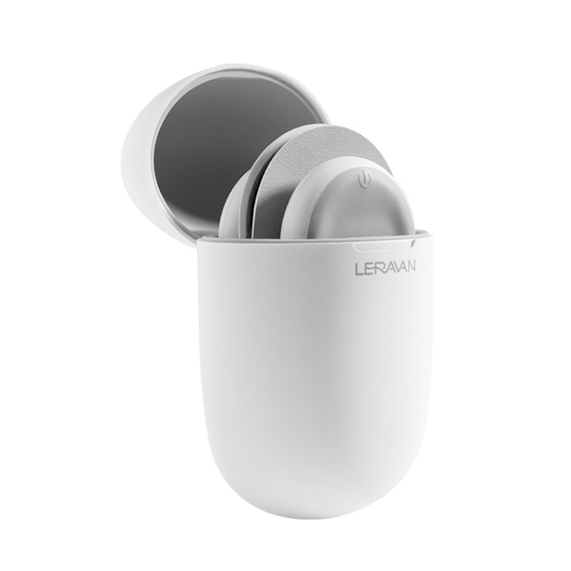 LERAVAN Magic Massage Stickers in open white carrying case revealing sleek white patches and compact control module