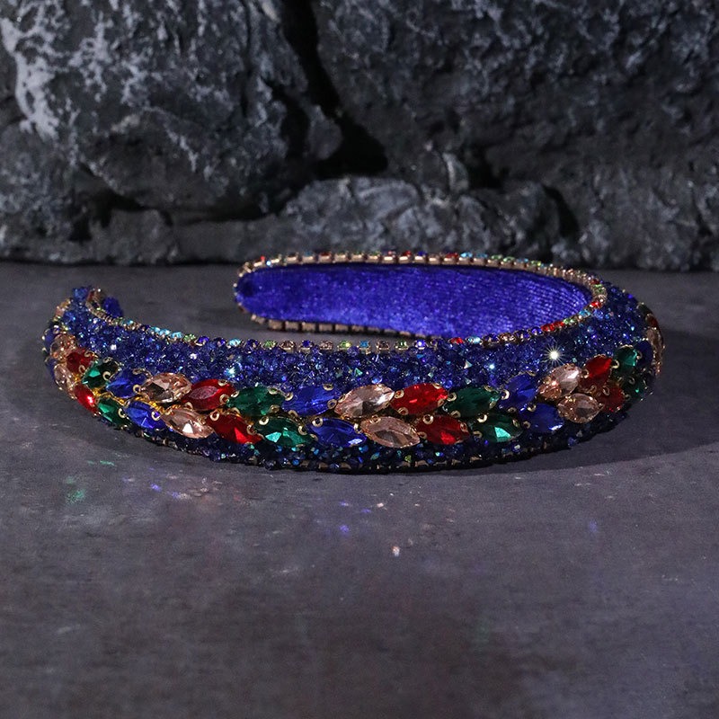 Royal blue padded headband with reflective crystal detail